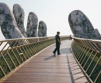 A person alone on the Golden Bridge, Vietnam.